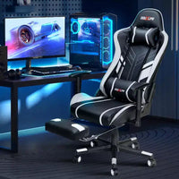 Chaise gaming ergonomique Douxlife moderne à massage 7 points avec repose-pieds et accoudoirs réglables, noir blanc