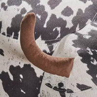 Ottoman vache en velours sur hévéa moderne GDFStudio Moria