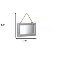 Miroir décoratif HomeRoots 9 avec cadre en métal argenté