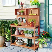 Table de rempotage rustique en bois de style ferme Whisen avec étagères de rangement et crochets latéraux, idéal pour le patio