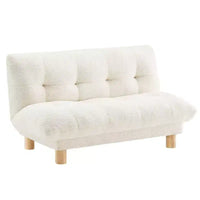 Canapé Enfant Rembourré en Fausse Fourrure de Mouton Buzz & Bloom avec Assise et Dossier Capitonnés, Pieds en Bois Guimauve