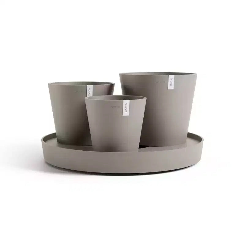 Ecopots Dubai Jardinière ronde moderne durable à arrosage automatique pour interieur/extérieur, à base de matière recyclee composite, avec roues et soucoupe, taupe, 22