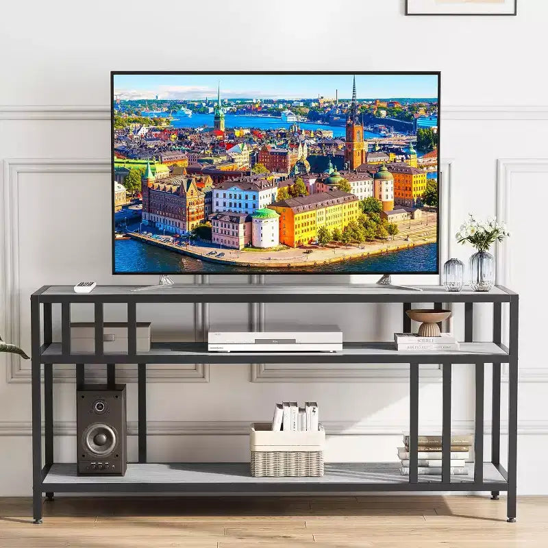 Meuble TV 65 pour téléviseurs jusqu'à 75, centre de divertissement gris avec étagères de rangement ouvertes et support à quadruple tube
