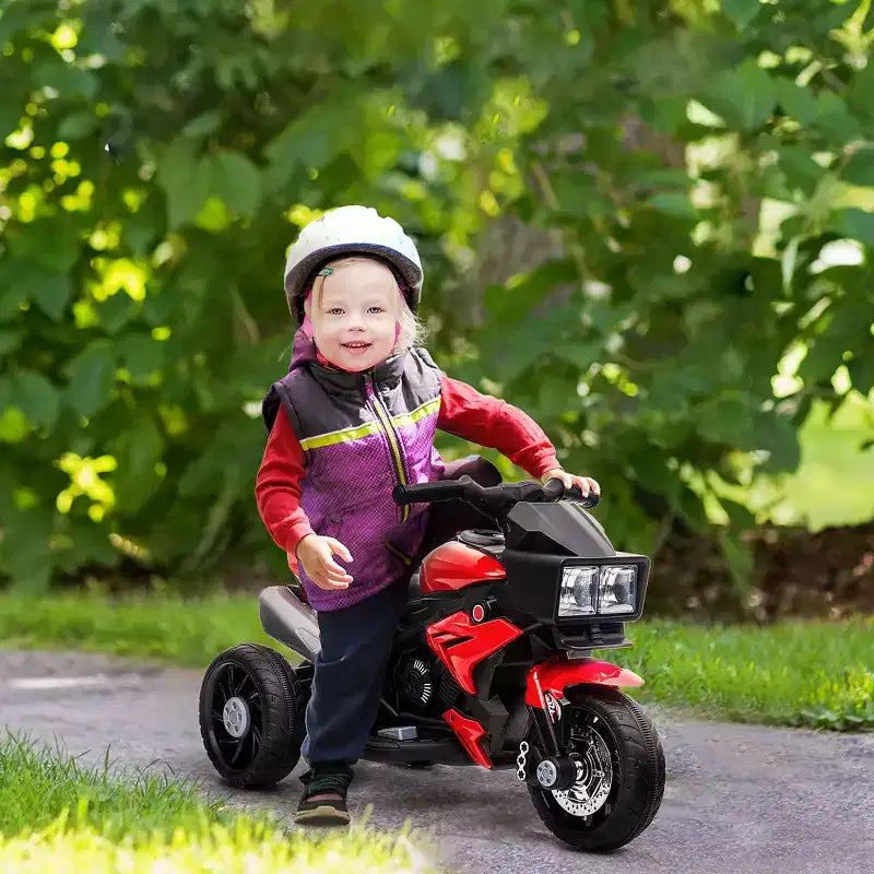 Moto électrique pour enfants avec phares, musique et stabilité à trois roues, rouge