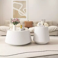 Table basse ronde en cuir avec plateau en pierre frittée et enveloppe en cuir microfibre