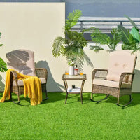 Ensemble bistro de patio à bascule avec table basse à 2 niveaux en verre trempé, coussins épais, ensemble de mobilier de jardin en résine tressée pour patio, arrière-cour