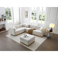 Canapé d'angle en velours beige capitonné avec ottomane et 4 oreillers