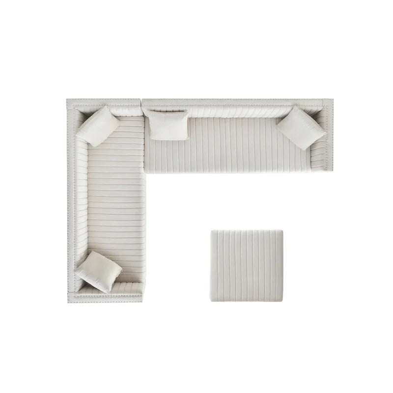 Canapé d'angle en velours beige capitonné avec ottomane et 4 oreillers