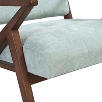 Fauteuil d'appoint moderne du milieu du siècle avec coussins moelleux, accoudoirs inclinés et cadre robuste en bois massif