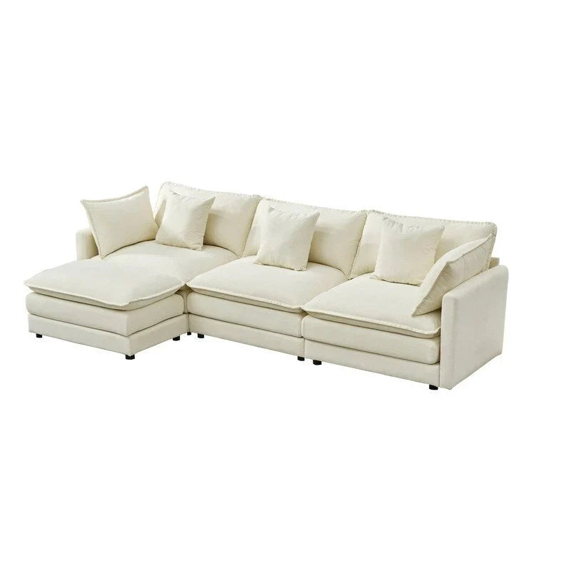 110.2 Canapé trois places capitonné en chenille, pouf