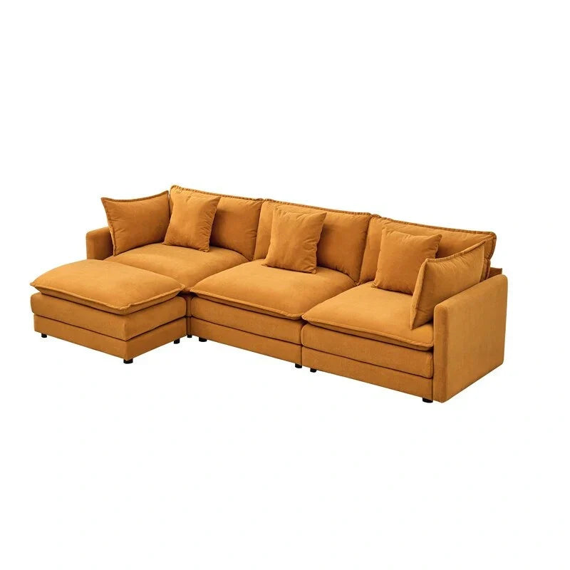 110.2 Canapé trois places capitonné en chenille, pouf