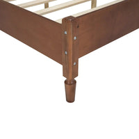 Lit double ancien en bois avec tête de lit en rotin