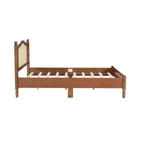 Lit double ancien en bois avec tête de lit en rotin