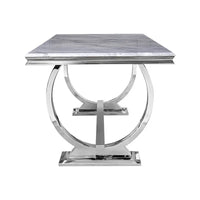 Table de salle à manger moderne avec piètement en U en acier inoxydable