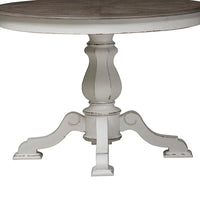 Table à dîner ronde sur pied Magnolia Manor avec rallonges escamotables - 2 finitions