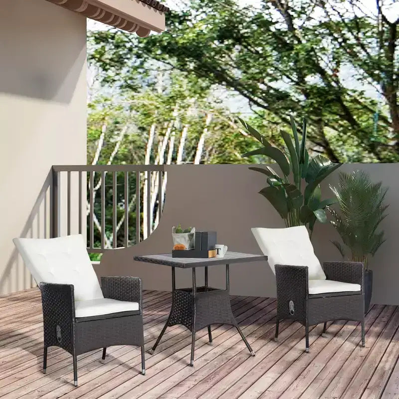 Ensemble de bistrot 3 pièces Outsunny, mobilier d'extérieur en rotin PE avec chaises inclinables et coussins touffus et table basse