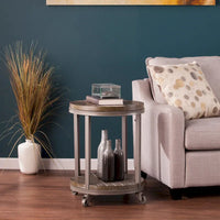 Table d'appoint ronde en bois marron industriel avec étagère SEI Furniture Kenya