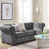 Canapé Chesterfield Gdansk avec accoudoirs arrondis et capitonnés