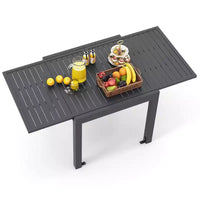 Table de salle à manger de terrasse extensible Costway 31,5-63 pour 4 à 6 personnes avec plateau à lattes