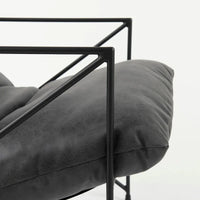Fauteuil d'appoint Leonidas en similicuir noir avec cadre en métal noir