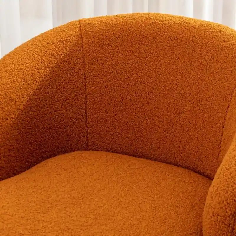 Fauteuil pivotant en tissu bouclette avec anneau en métal thermolaqué
