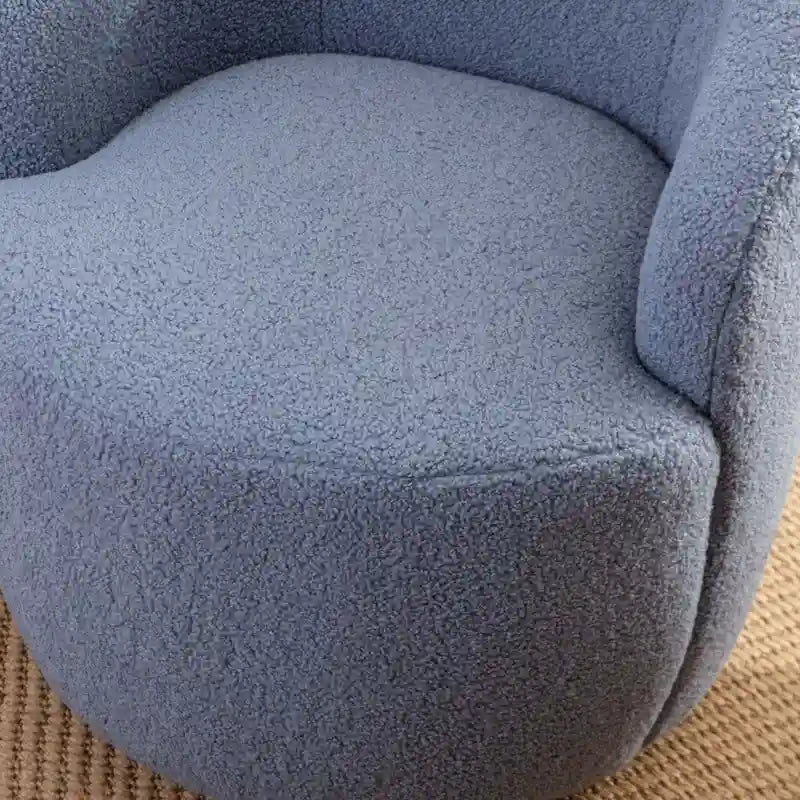 Fauteuil pivotant en tissu bouclette avec anneau en métal thermolaqué