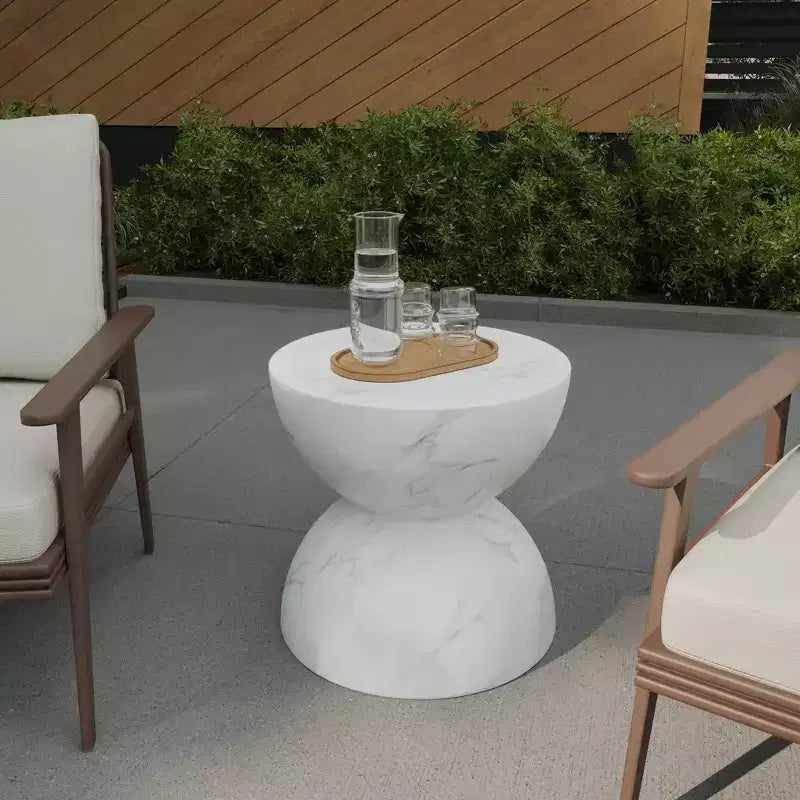 LeisureMod Serie Sage Table d'appoint minimaliste en pierre composite en forme de sablier, table d'appoint moderne pour interieur ou patio, design durable pour petits espaces