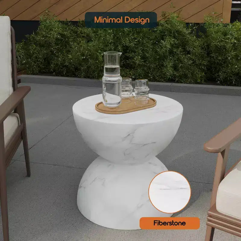 LeisureMod Serie Sage Table d'appoint minimaliste en pierre composite en forme de sablier, table d'appoint moderne pour interieur ou patio, design durable pour petits espaces