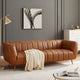 Canapé en cuir rembourré de style moderne du milieu du siècle Clovis de couleur cognac