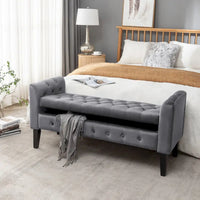 Banc de rangement en velours Porthos Home Brett avec pieds en bois d'hévéa