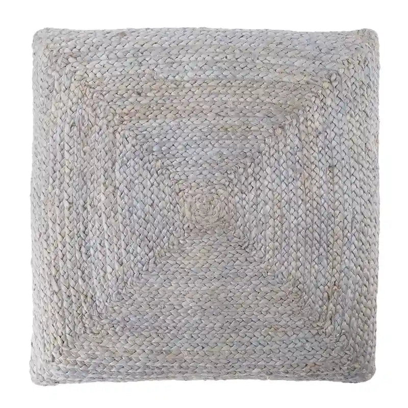 Le pouf/coussin de sol en jute texturé Faxon de Curated Nomad
