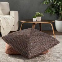 Le pouf/coussin de sol en jute texturé Faxon de Curated Nomad