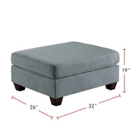 Pouf de cocktail tapissé de tissu effet lin