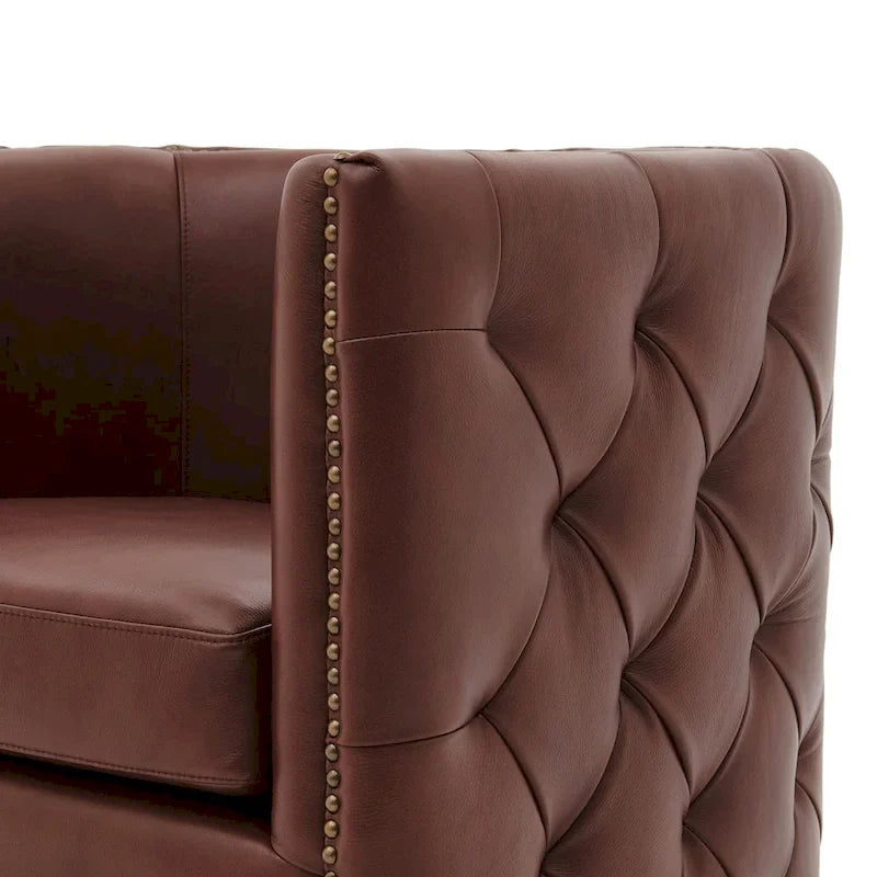 Fauteuil pivotant capitonné en cuir pleine fleur Leslie