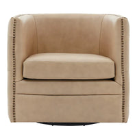 Fauteuil pivotant capitonné en cuir pleine fleur Leslie