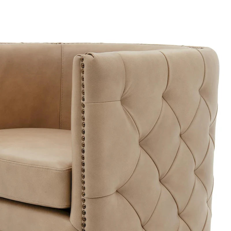 Fauteuil pivotant capitonné en cuir pleine fleur Leslie