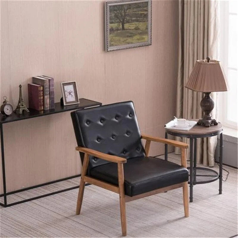 Fauteuil rétro moderne en similicuir noir