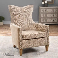Fauteuil Uttermost Kiango, tons neutres et motif animalier