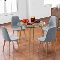 Ensemble de salle à manger Gymax 5 pièces avec table ronde en verre trempé et 4 chaises en tissu