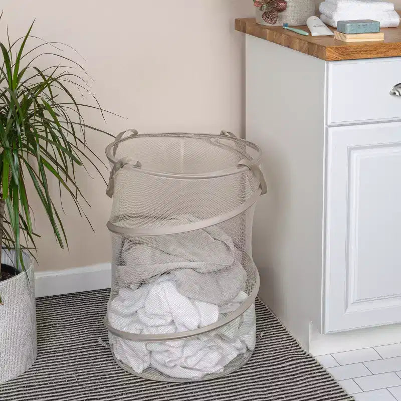 Panier à linge escamotable en maille, cadre en acier à ressort, doublure en maille pour circulation d'air, grande capacité, installation facile, rangement compact