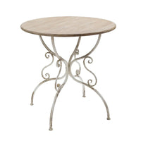 Table ronde en bois avec pieds en métal ouvragé