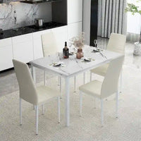 Ensemble de table à manger Mieres de style moderne 5 pièces à plateau en faux marbre avec 4 chaises de salle à manger rembourrées en similicuir