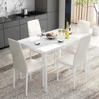 Ensemble de table à manger Mieres de style moderne 5 pièces à plateau en faux marbre avec 4 chaises de salle à manger rembourrées en similicuir