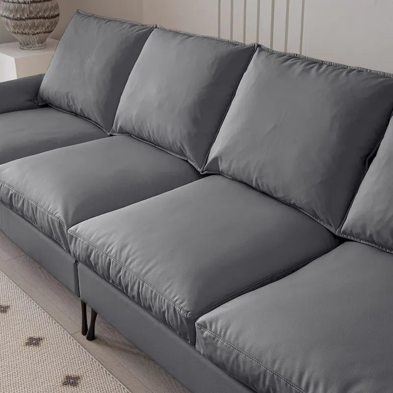 Canapé d'angle moderne 104,5 po avec revêtement en cuir technique et pouf convertible, gris foncé