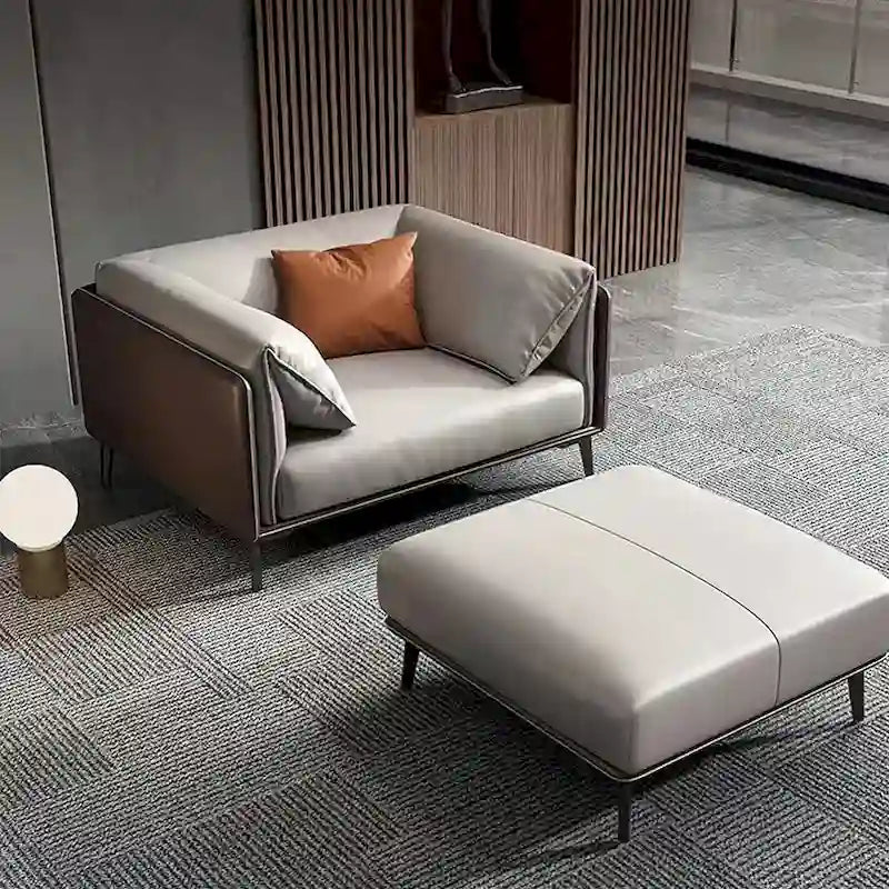 Canapé en similicuir avec accoudoirs rembourrés et coussins réversibles - une place