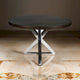 Table de salle à manger ronde Emi 47 pouces, acier brossé croisé en X, bois brun foncé