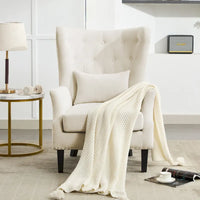 Fauteuil à oreilles classique en velours côtelé avec clous décoratifs, oreiller lombaire et pieds en hévéa