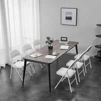 Chaises pliantes élégantes en fer et PVC pour conventions et expositions Blanches