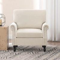 Fauteuil moderne rembourré avec clous décoratifs et pieds en bois